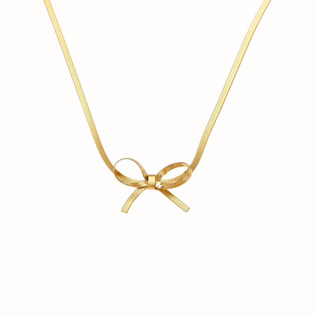 Gold stainless steel bow choker with snake chains.
