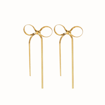 Gold bow stud earrings with long dangling chains.