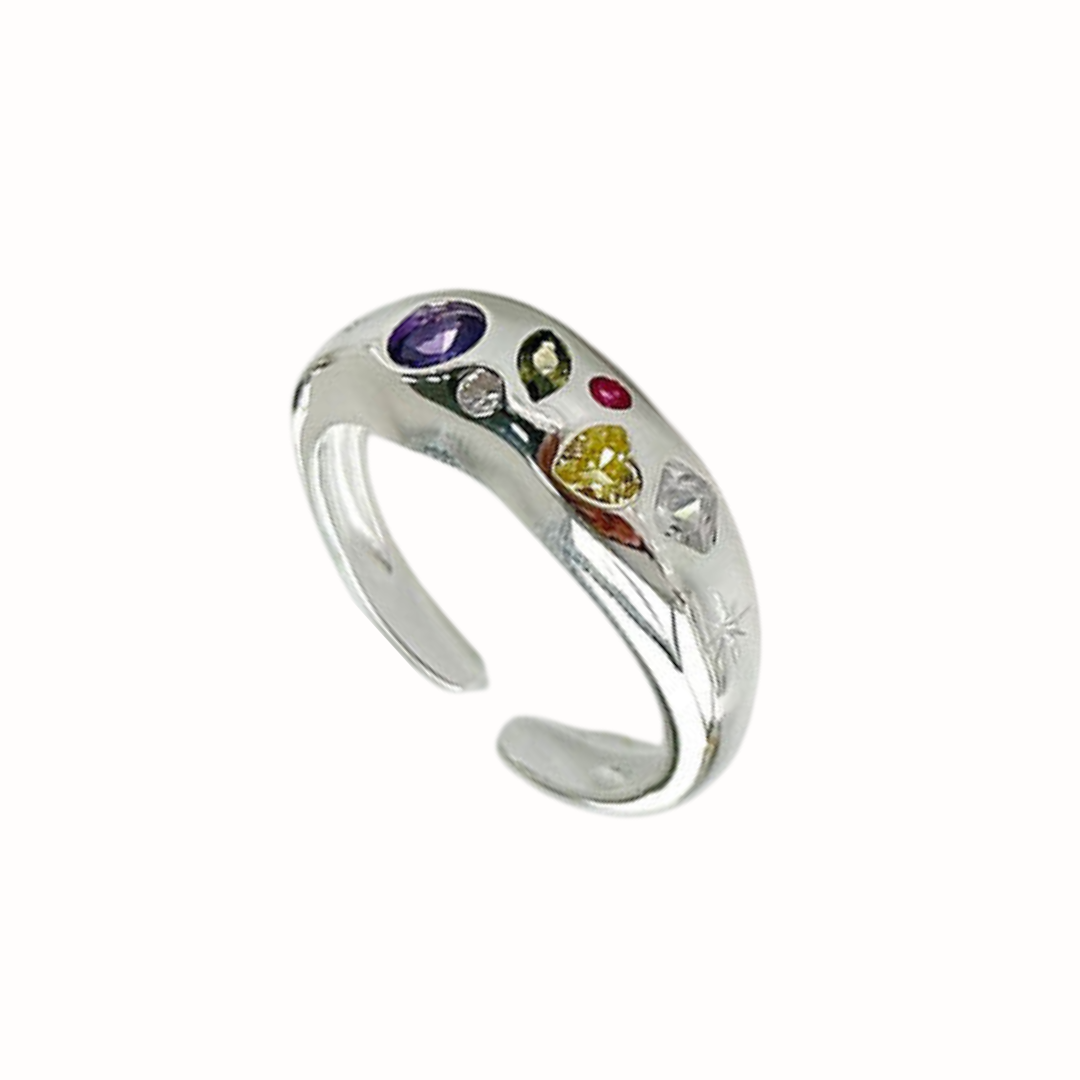 Sterling silver adjustable ring with rainbow cubic zirconia stones.