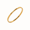 Polished stainless steel bangle bracelet with a sleek clasp.
